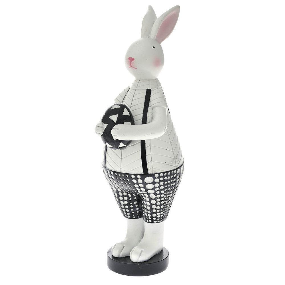 77971 ZEKA U CRNO BELIM PANTALONAMA NOSI JAJE OD POLIREZINA 8X10X25 CM